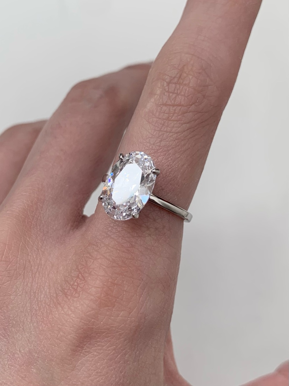 Oval Cut Solitaire Ring on a silver band